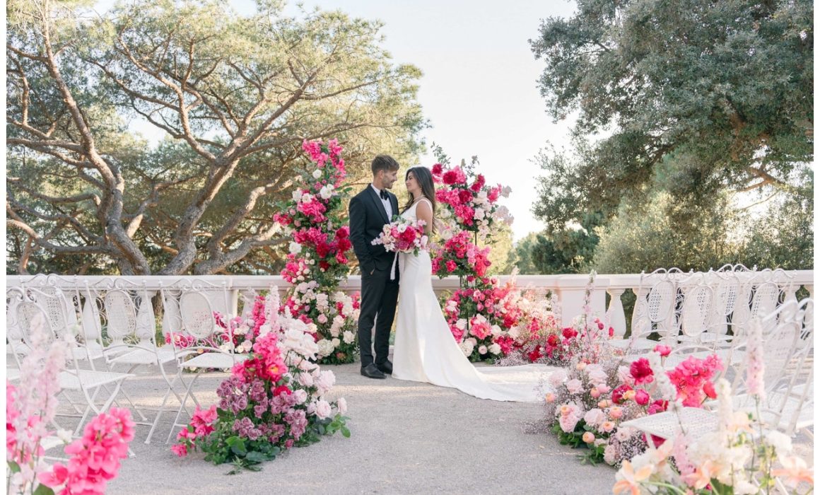 Castel bay pink hues wedding arch