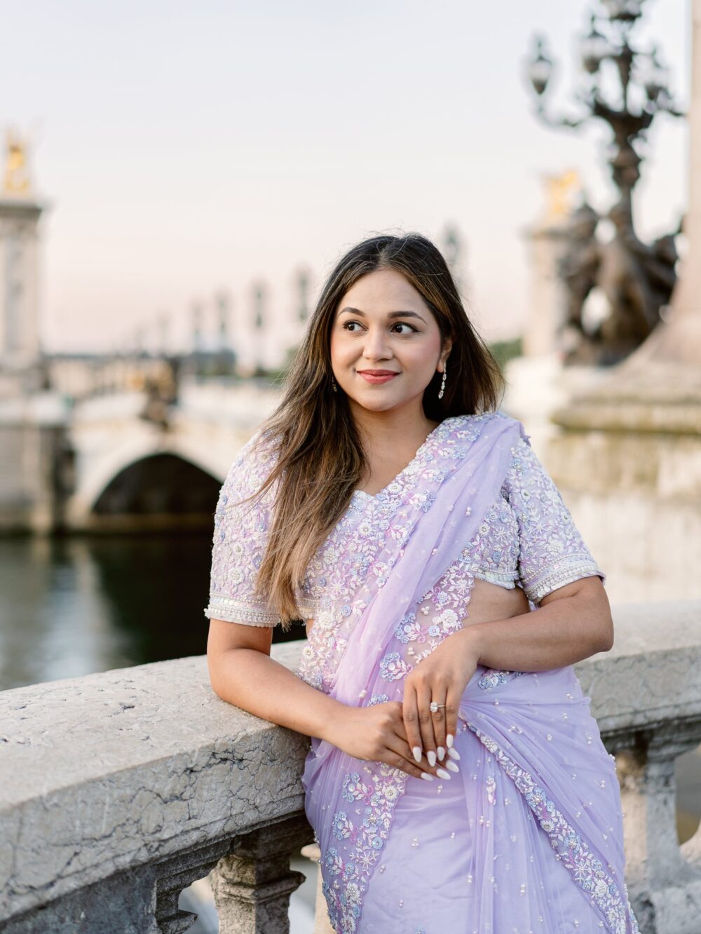 portrait of Poorva in a purple sari