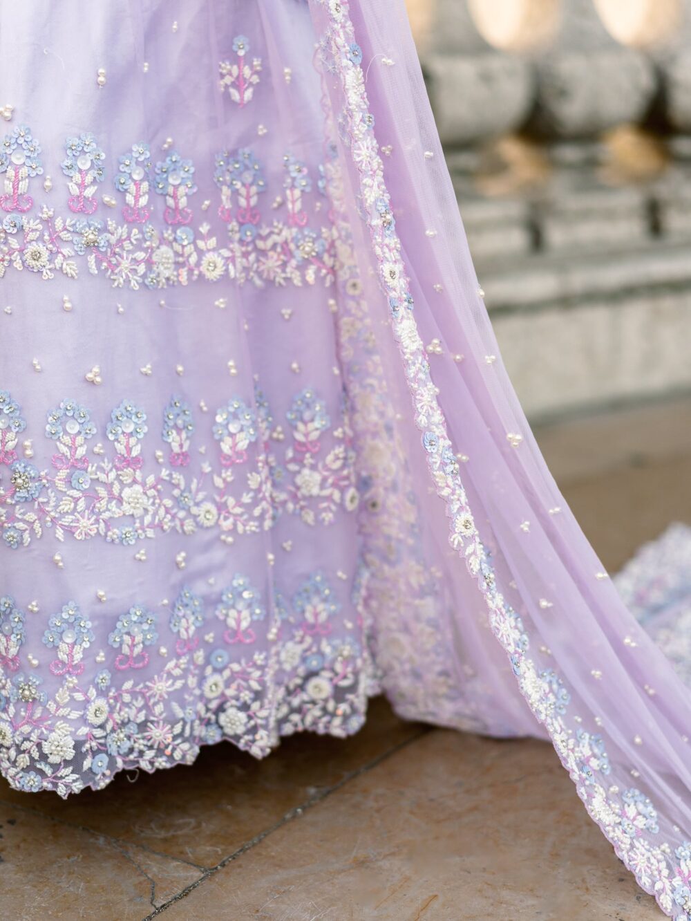 close up on the sari with pearls