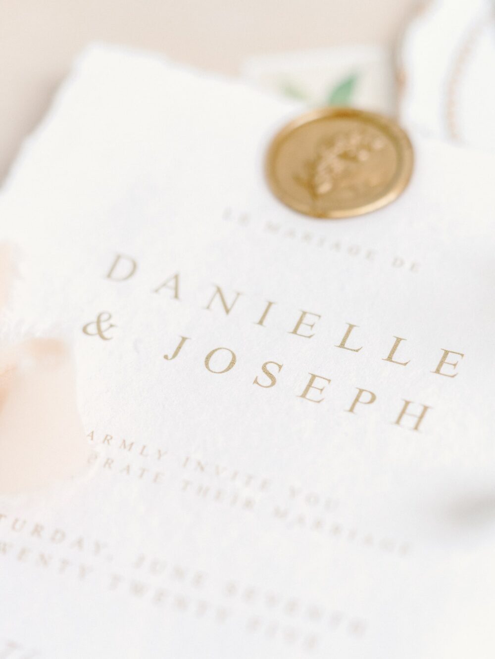 Wedding invitation with golden seal wax