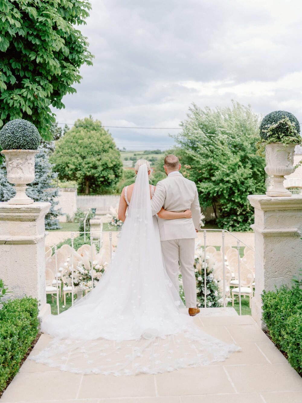 Bride and groom looking at the landscape