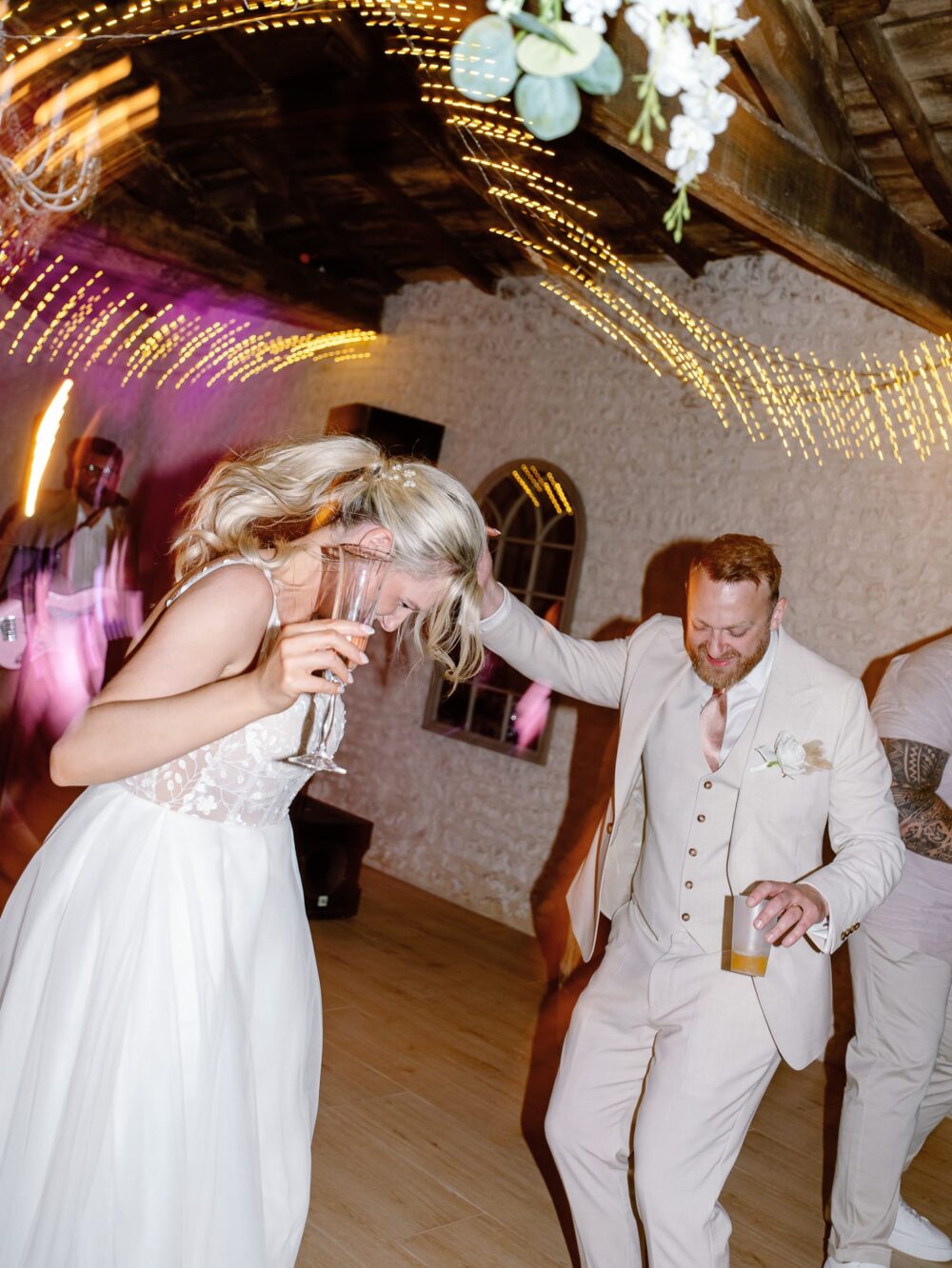 bride and groom dancing