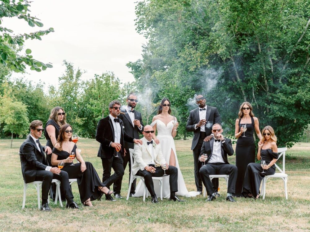 wedding group with cigars and cocktail