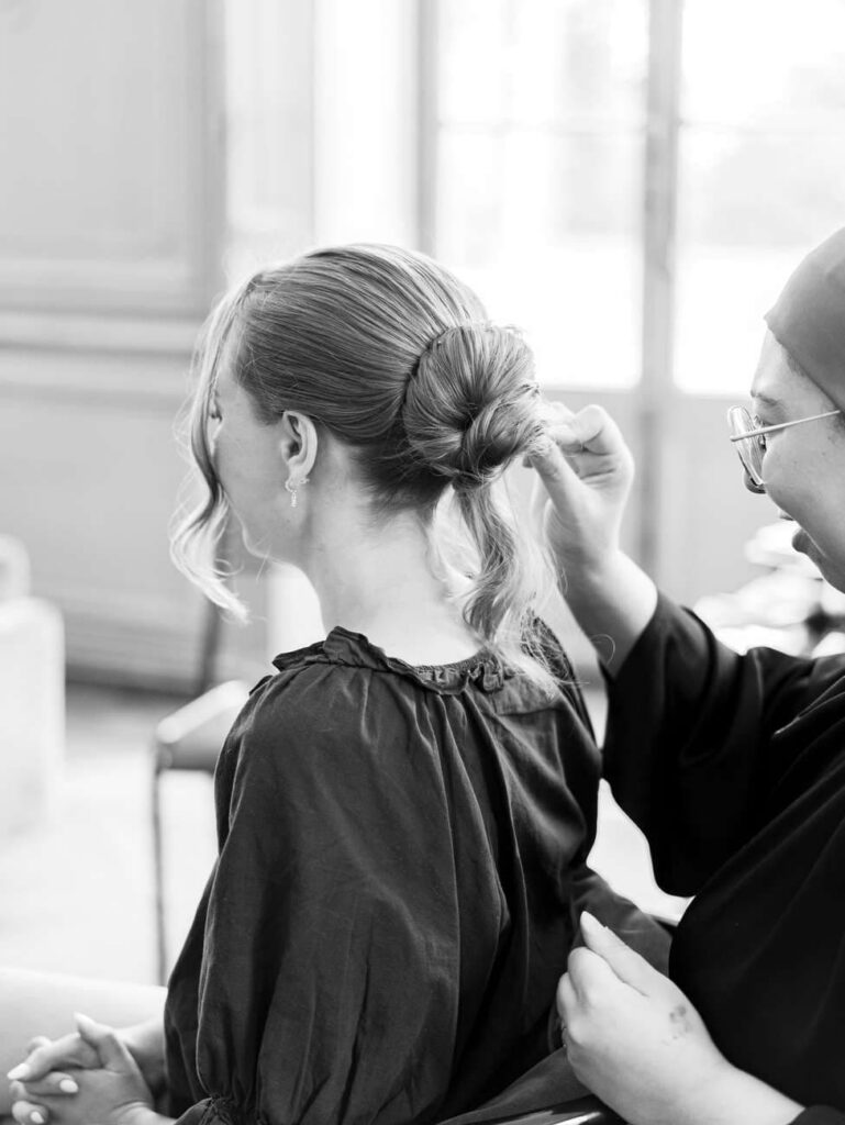 Bride getting hairstyle
