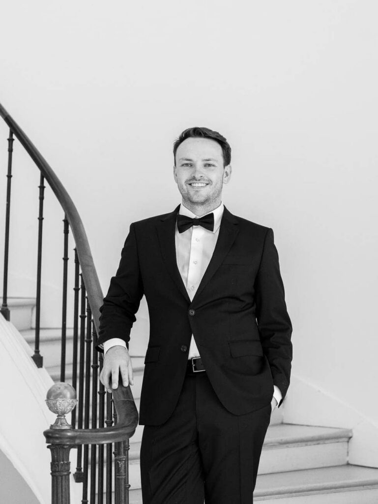 Groom portrait in the staircase