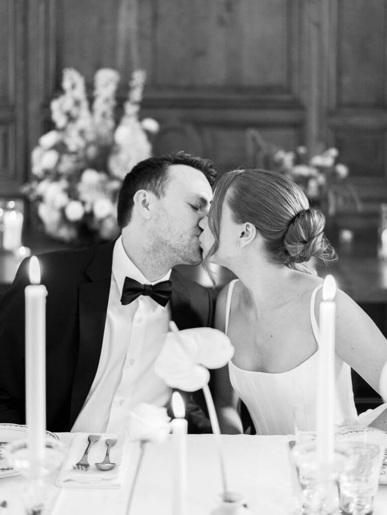 Bride and groom kiss