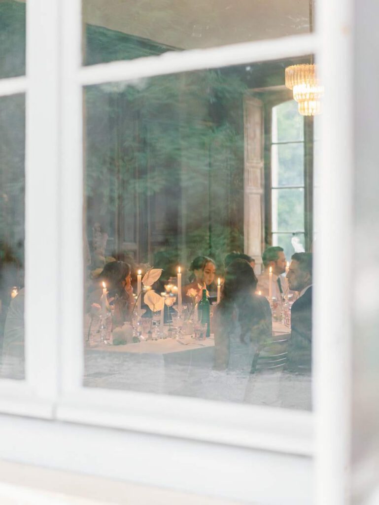 wedding dinner viewed from a window