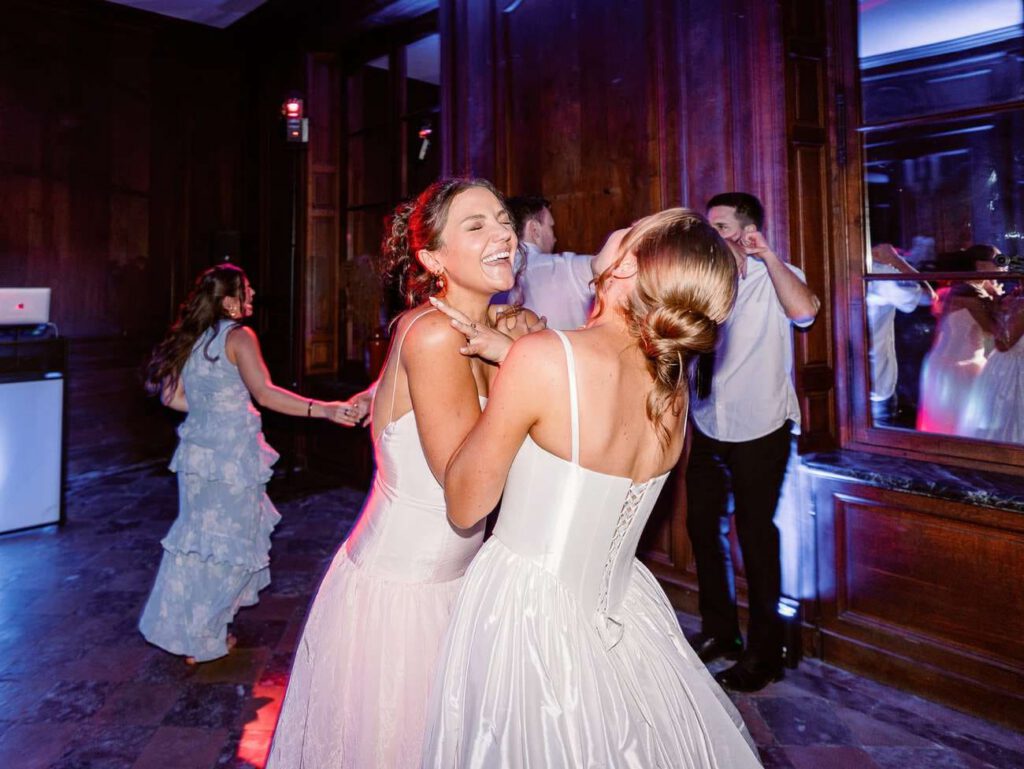 Bride dancing with her sister