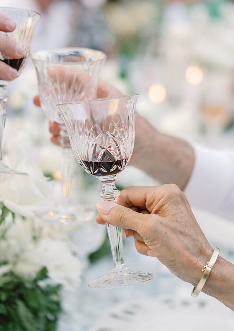 guest raising their glasses