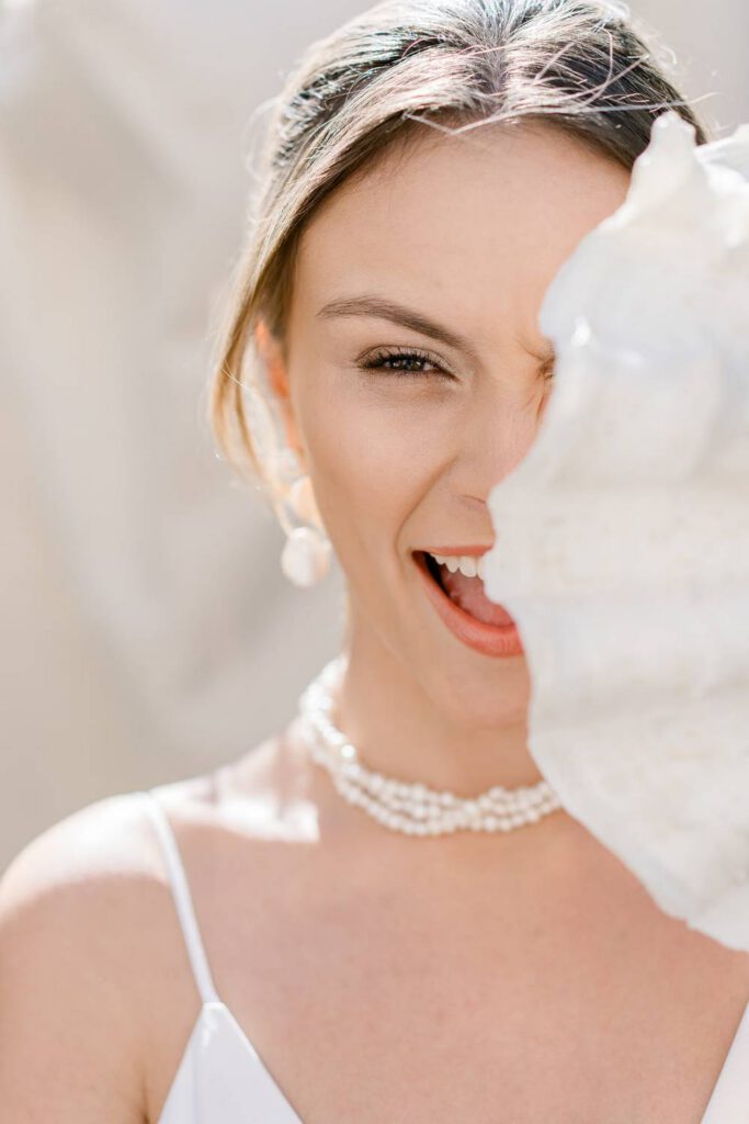 Bride portrait with a seashell