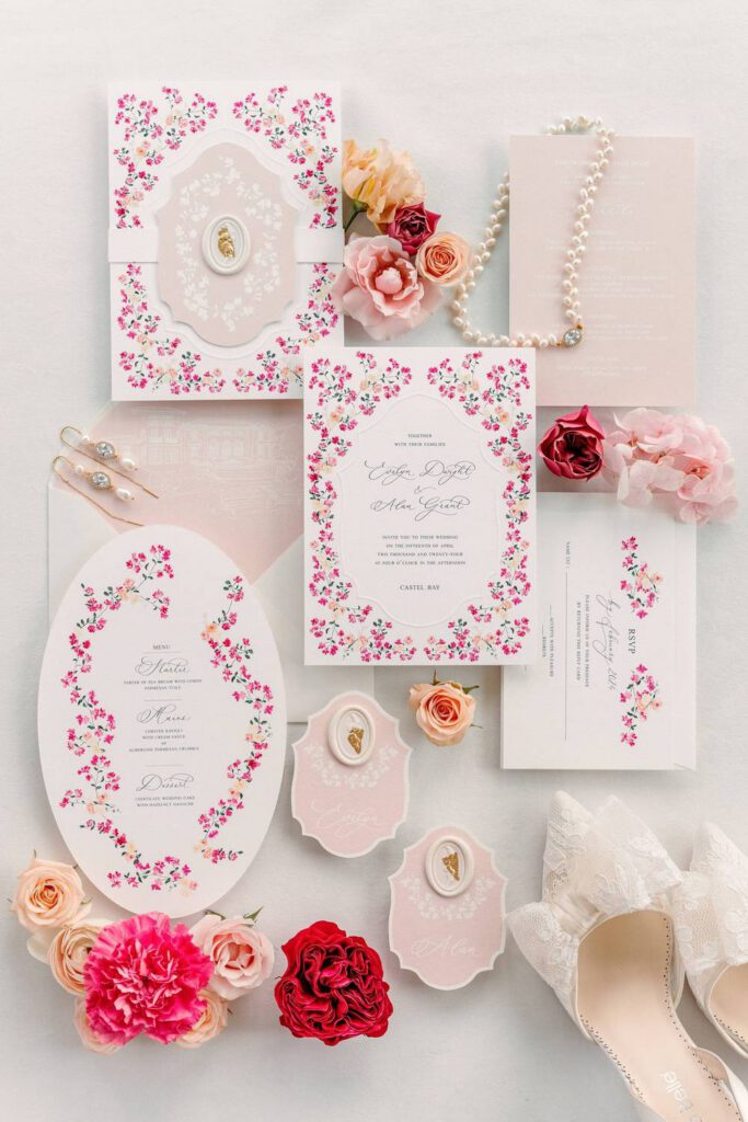 wedding invitations in white and fushia/magenta