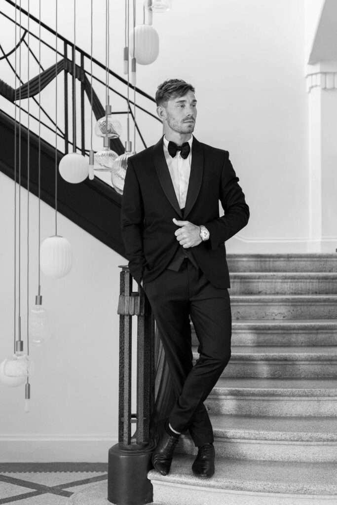 groom portrait in a staircase