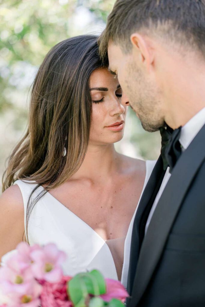 Bride and groom portrait at Castel Bay