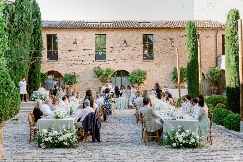 wedding dinner reception in the courtyard of at Château de Fontarèches