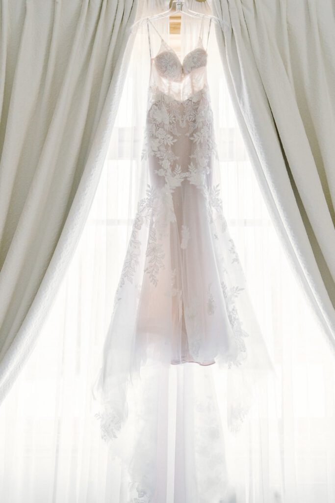 wedding dress at a window