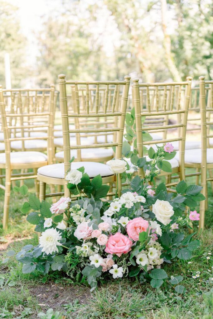 golden chairs and pink flowers