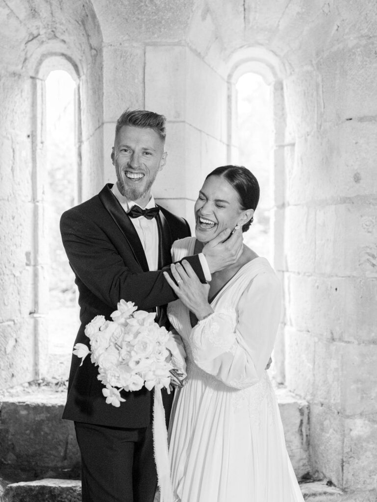 Bride and groom laughing