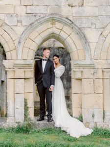 Bride and groom portrait in an old abbey