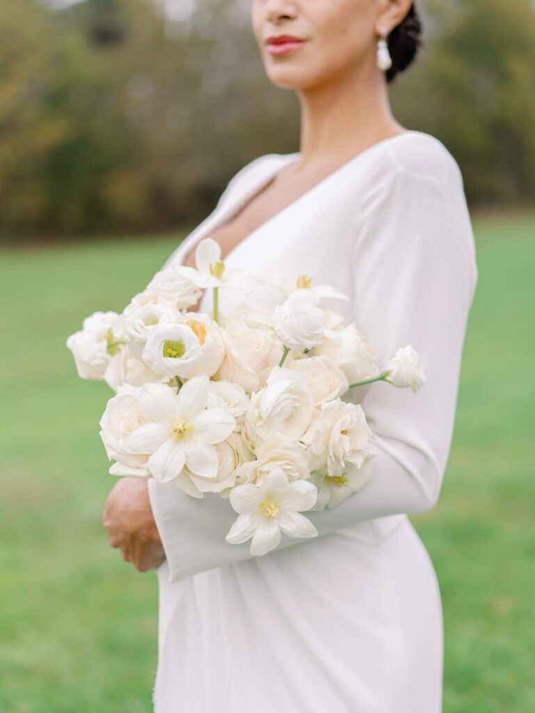 Bride holding a white bouquet