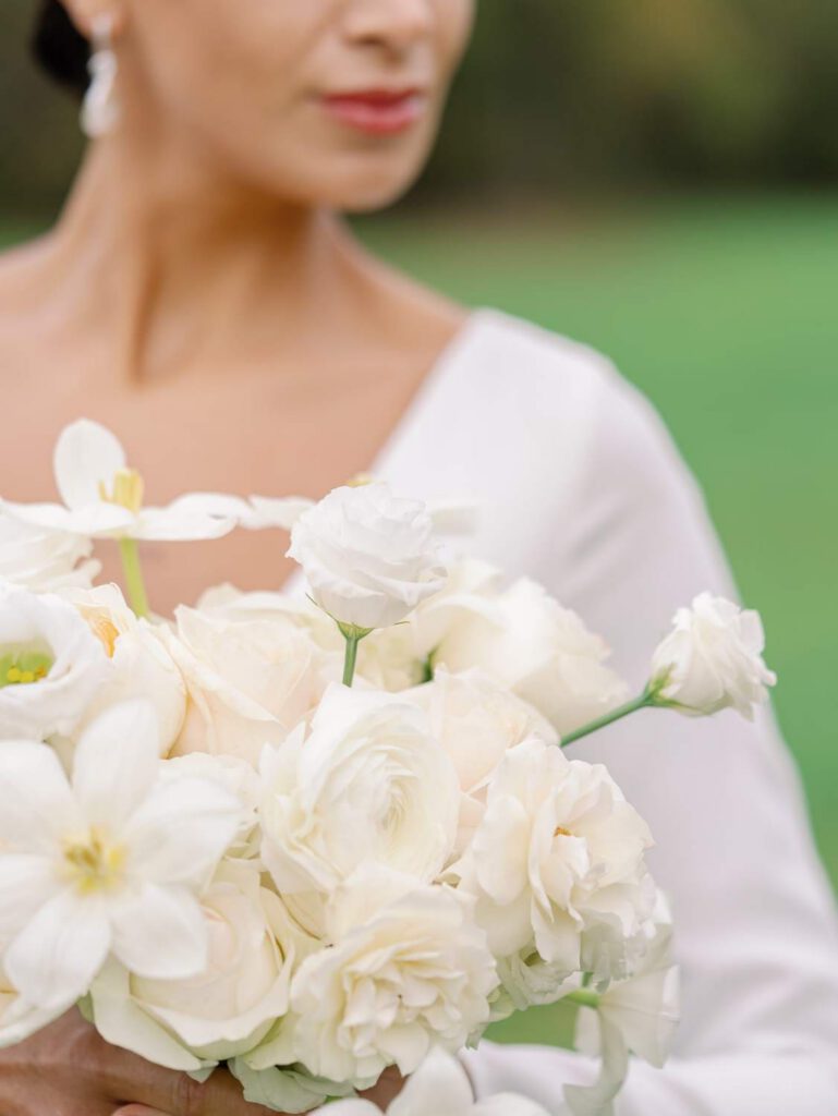 Bride holding a white bouquet