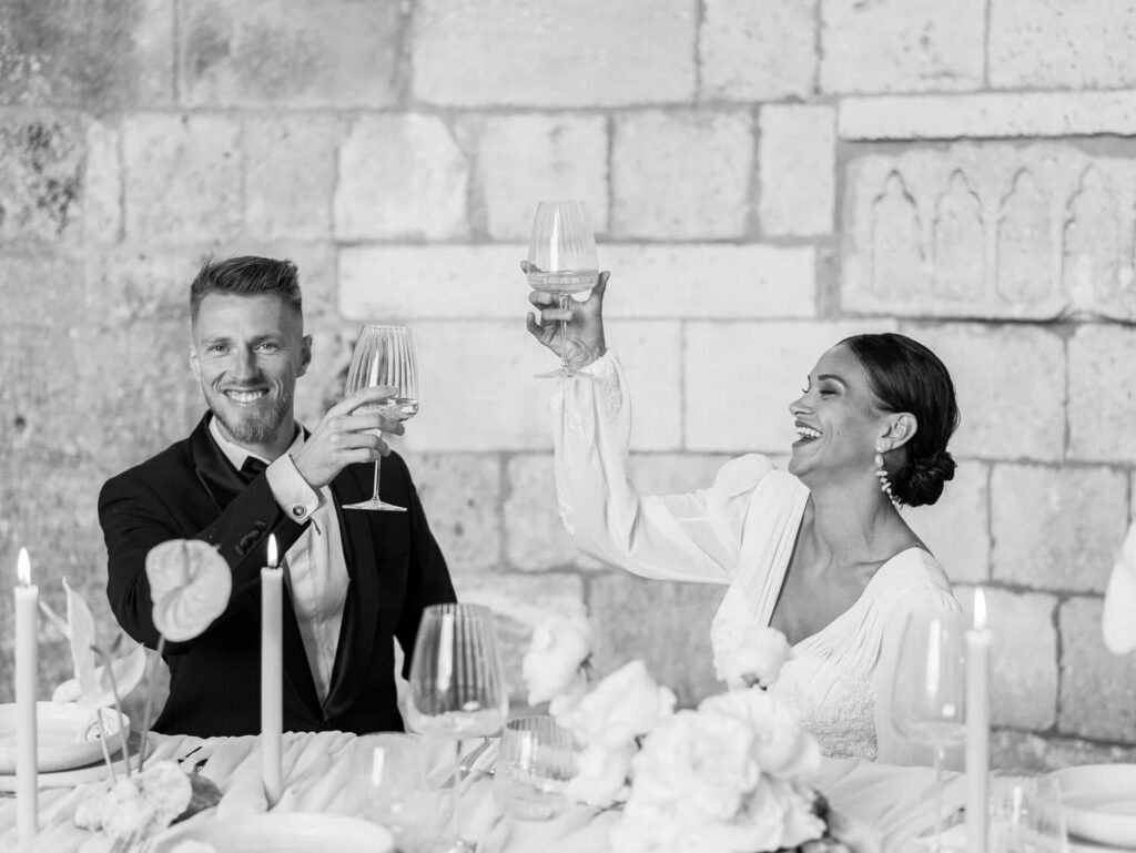 Bride and groom cheering