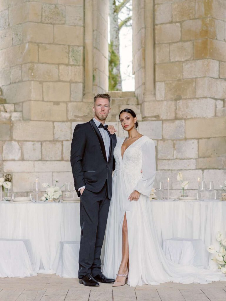 Bride and groom portrait in an old abbey