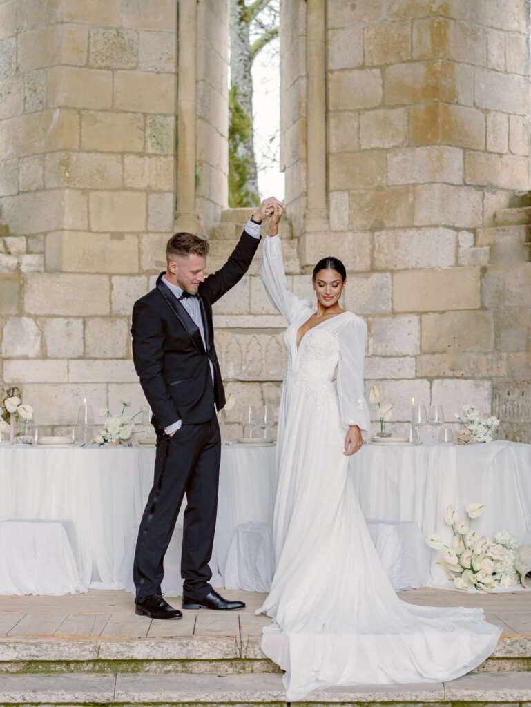 Bride and groom portrait in an old abbey