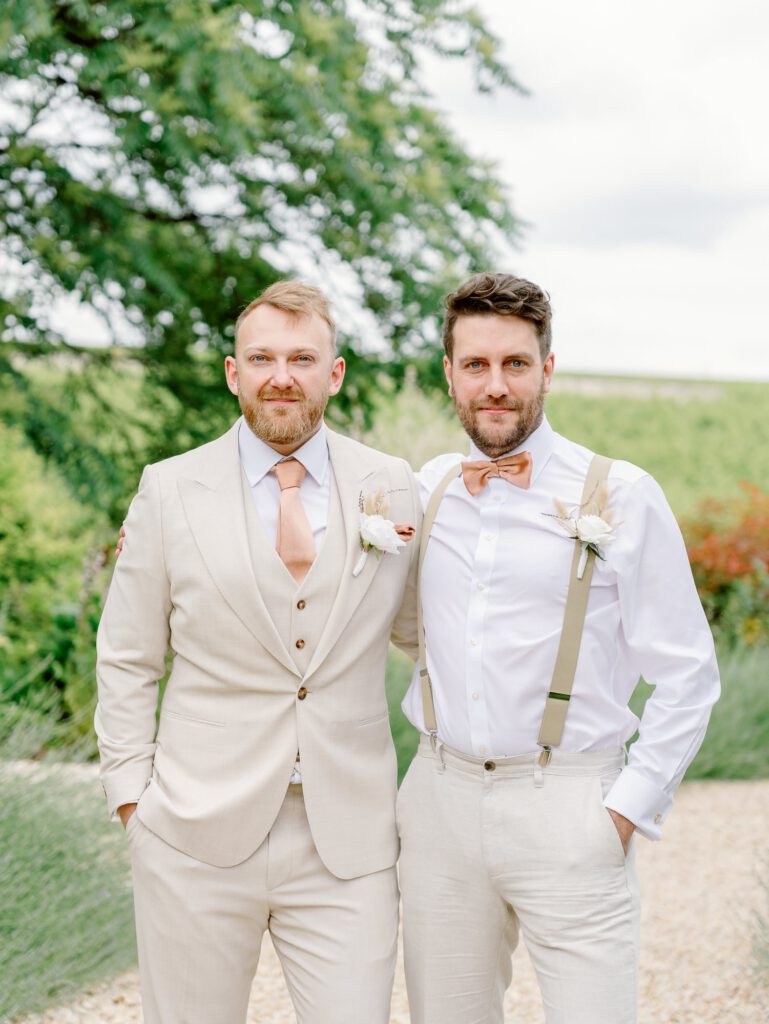 portrait of the groom and his groomsman