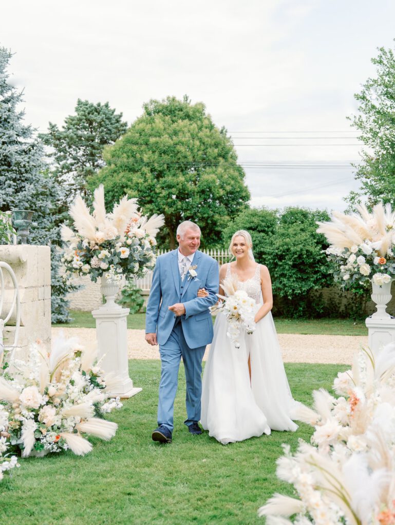 Bride arriving with her father