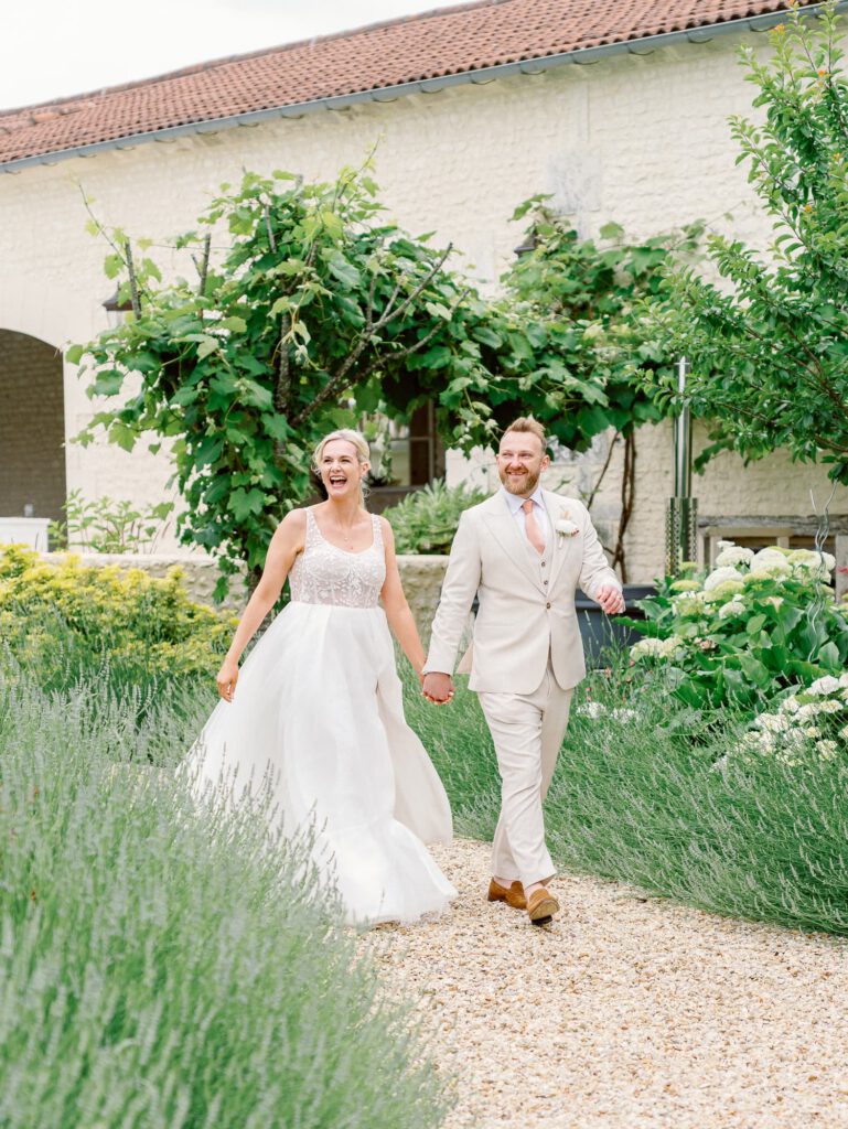 Bride and groom entering the reception