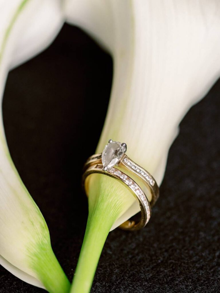 wedding ring on an arum flower