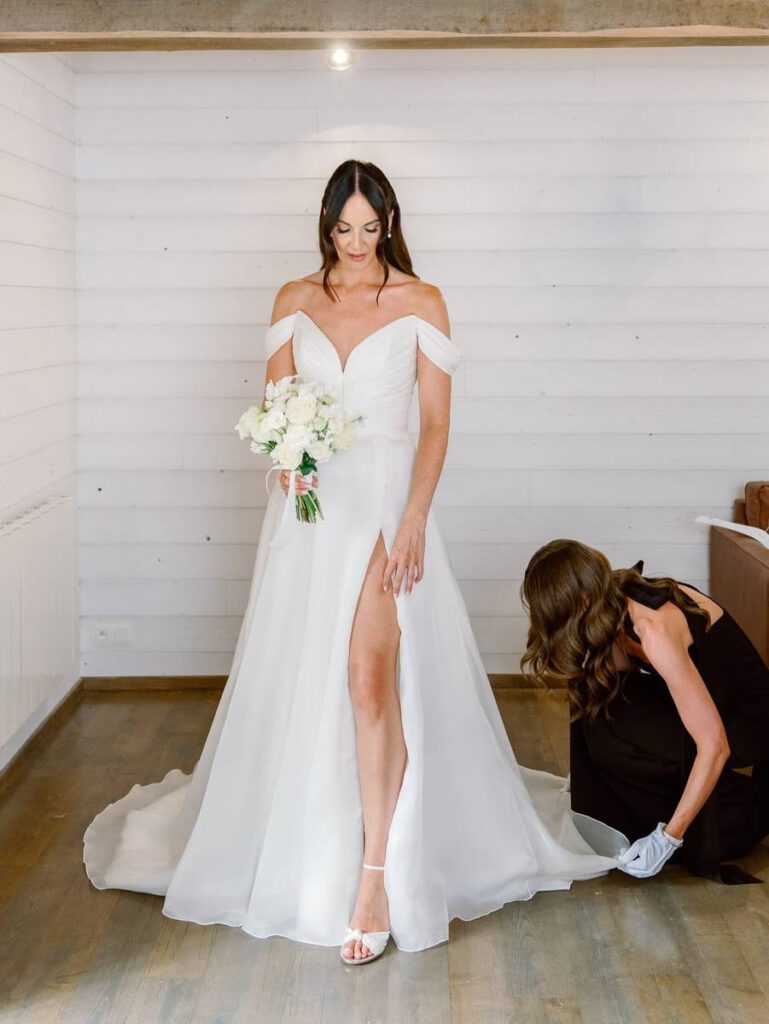 bride getting dressed at clos des charmes