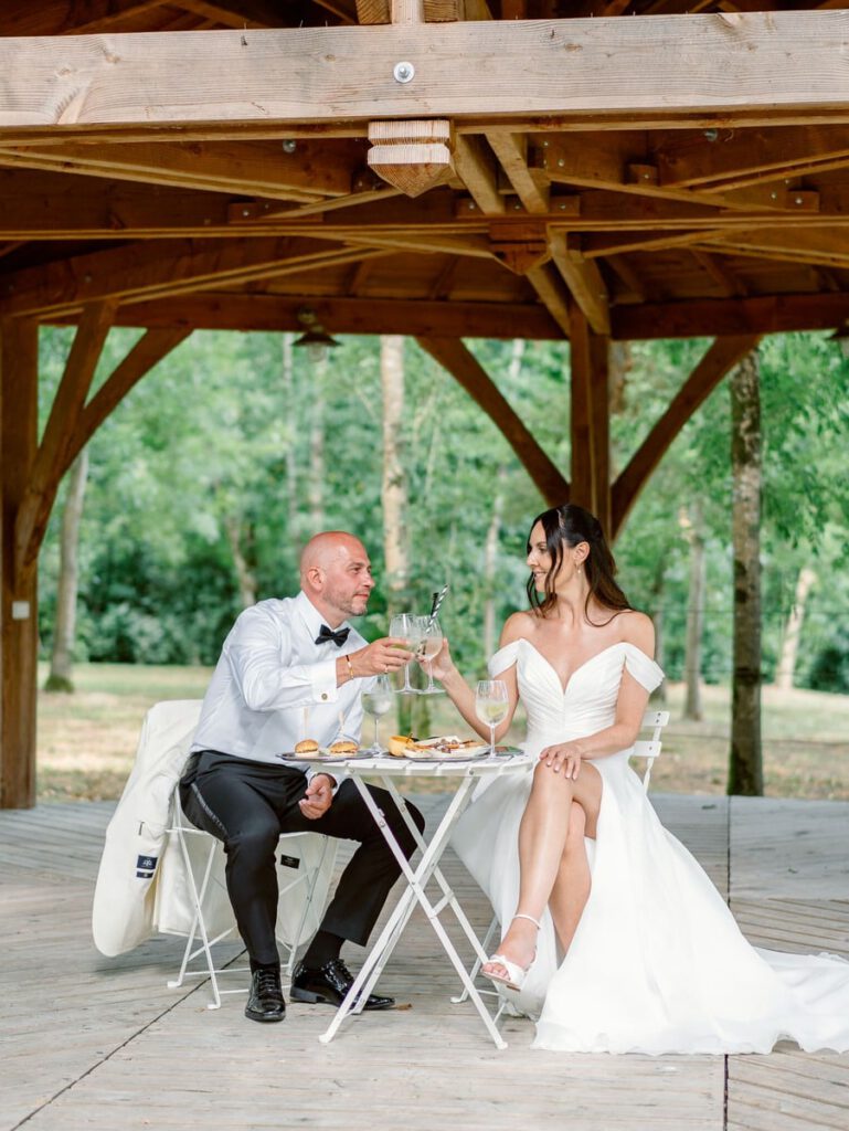bride and groom eating cocktail