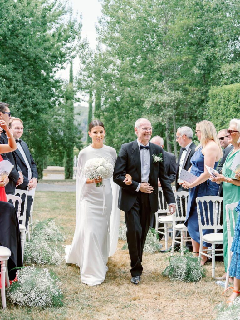Bride arriving with her father