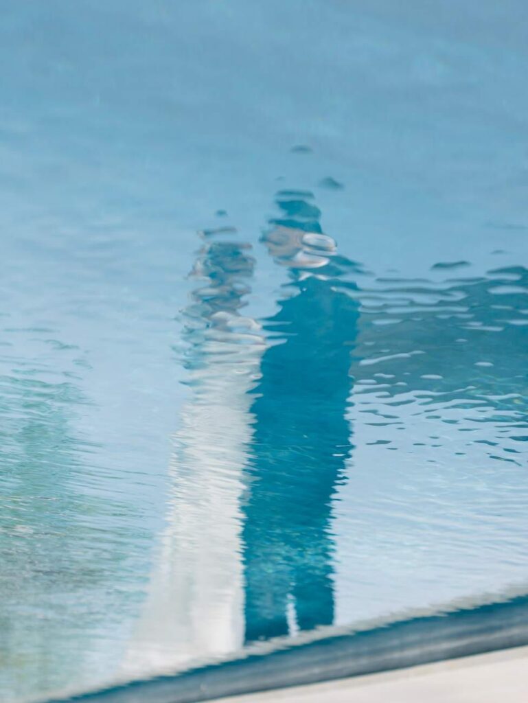 bride and groom reflection