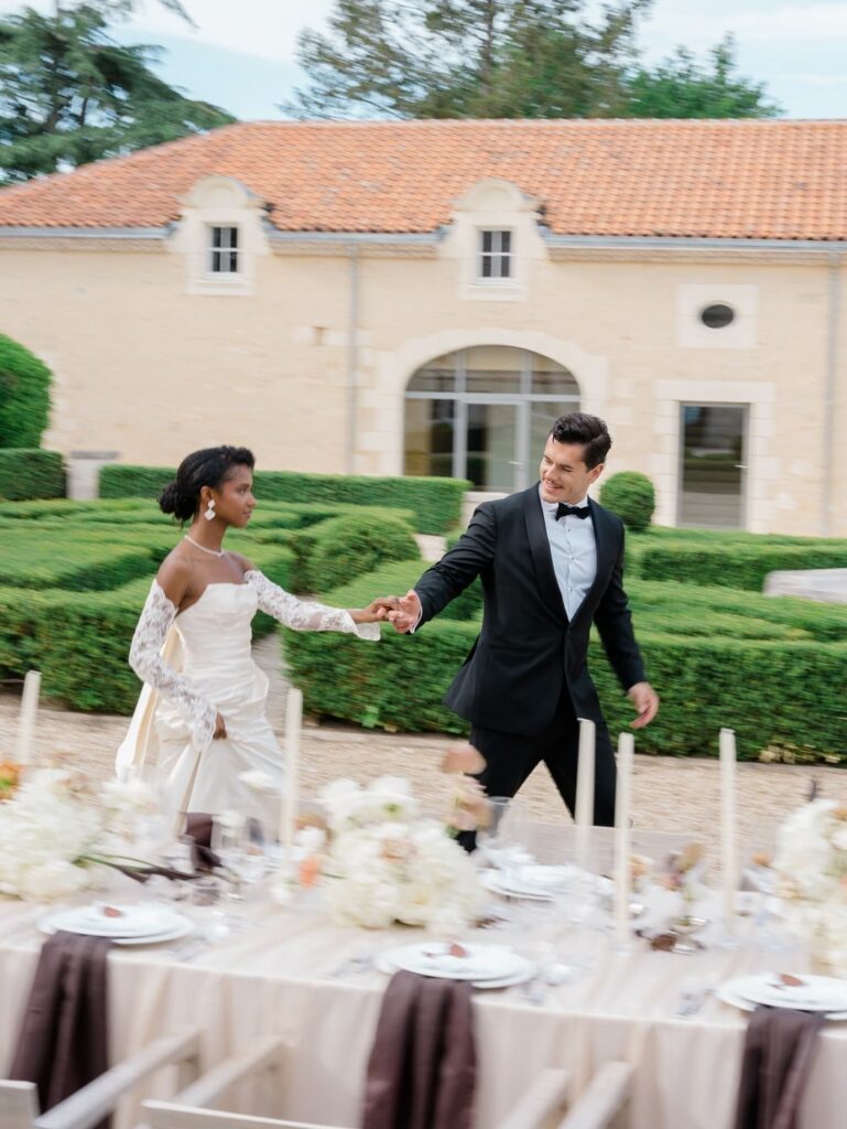Bride and groom near the table