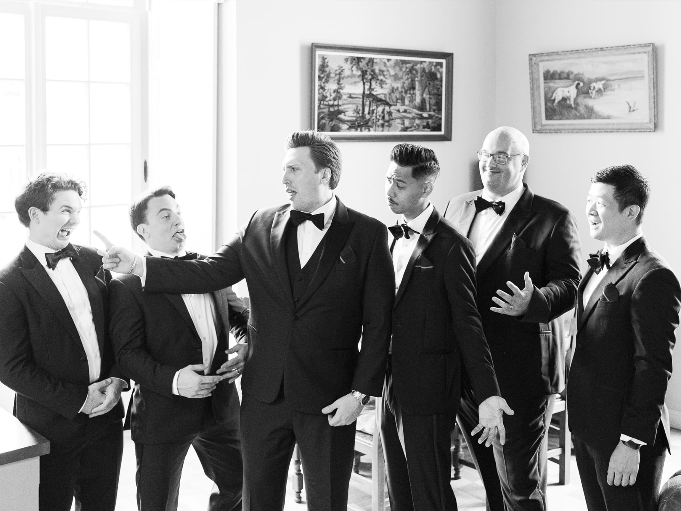 Grooms laughing