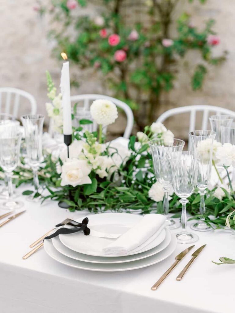 wedding table with green leaves