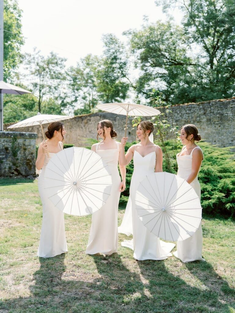bridesmaids with parasols
